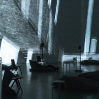 Titel: makropolis - Performance Konzert Installation. Konzept, Raum, Text, Musik, Video und Regie: Joerg Laue. Kuenstl. Mitarbeit und Kostuem: Nina DeLudemann. Bildregie: Florian Fischer. Klangregie: Mattef Kuhlmey. Licht: Fabian Bleisch. Koproduktion Lose Combo und dem Ensemble KNM und KINDL. Ort: KINDL - Zentrum fuer zeitgenoessische Kunst, Maschinenhaus. Urauffuehrung: 18. Januar 2023. no model release. SpielerInnen: Claudia Splitt und Florian Feigl / Performance; Ensemble KNM: Rebecca Lenton / Floete, Carol Mc Donnel / Klarinette, Peng-Hui Wang / Fagott, Jack Adler-McKean / Tuba, Theodor Flendell / Violine, Cosima Gerhardtt / Cello und Jonathan Heilbronn / Kontrabass u.a..
Engl: theatre, music, actor, performer
copyright: david baltzer / bildbuehne.de